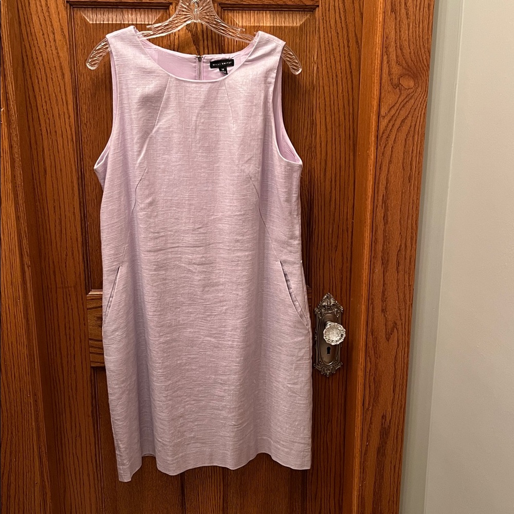 Light lavender linen sleeveless sheath dress.